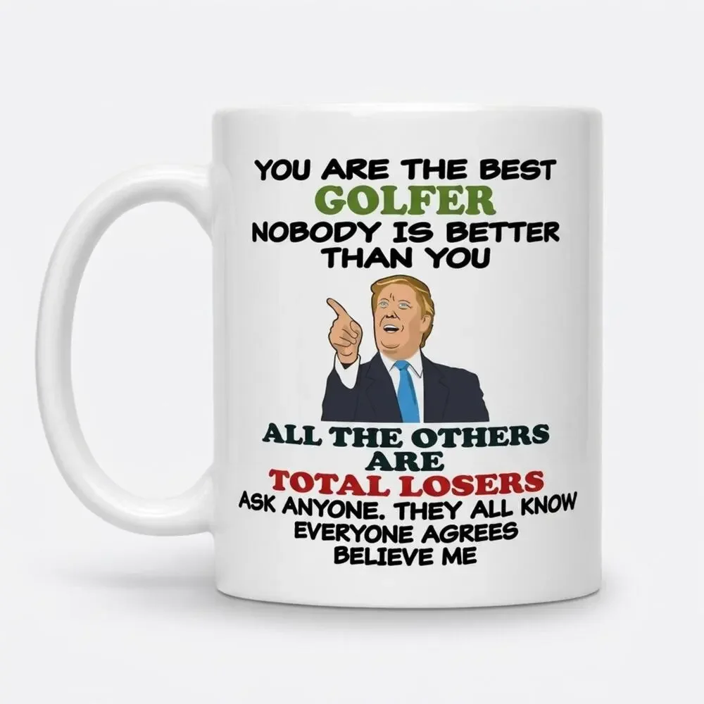 🧚🏻‍♀️ Trump “Best Golfer” Novelty Coffee Mug NIB Funny White Elephant Gift
